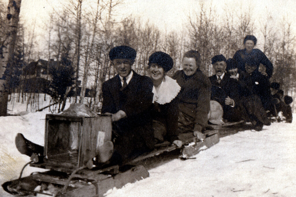 Unknown people having fun in the snow